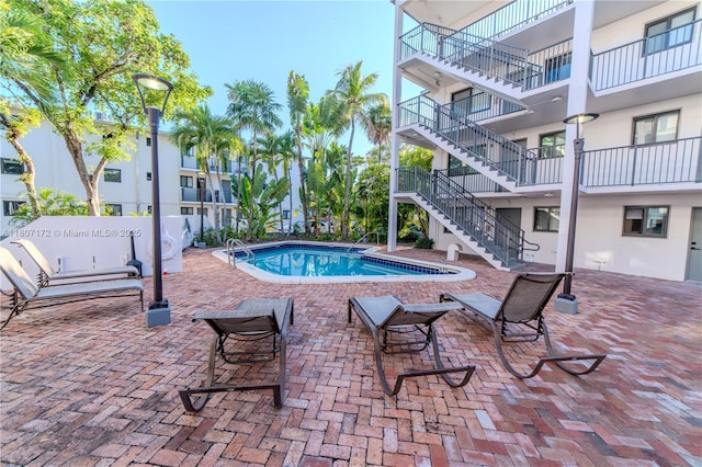 2924 Day Ave Unit Ph4N, Miami, FL 33133 - community pool with stairway and a patio
