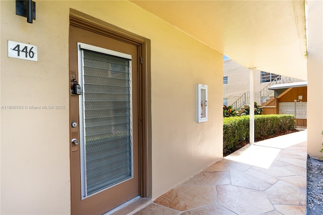 446 Flanders J 4460, Delray Beach, FL 33484 - entrance to property featuring stucco siding