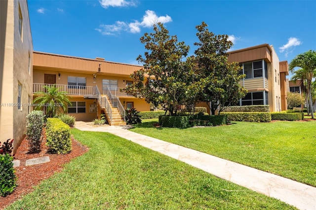 446 Flanders J 4460, Delray Beach, FL 33484 - view of building exterior with stairs