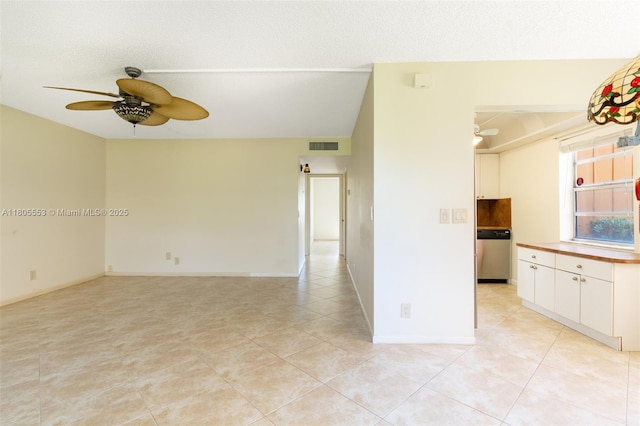 446 Flanders J 4460, Delray Beach, FL 33484 - spare room with a ceiling fan, light tile patterned floors, and baseboards