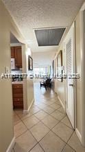 2200 N Park Ln Unit 311, Hollywood, FL 33021 - hallway with light tile patterned flooring