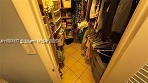 2200 N Park Ln Unit 311, Hollywood, FL 33021 - spacious closet featuring tile patterned flooring