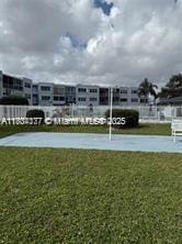 2200 N Park Ln Unit 311, Hollywood, FL 33021 - surrounding community with a lawn