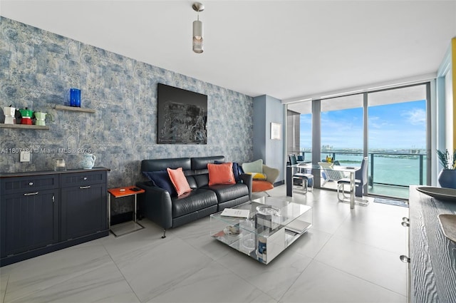 650 Ne 32 3302, Miami, FL 33137 - living area with floor to ceiling windows, wallpapered walls, and a water view