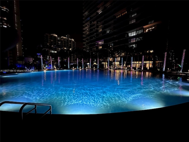 650 Ne 32 3302, Miami, FL 33137 - pool at twilight with a view of city lights