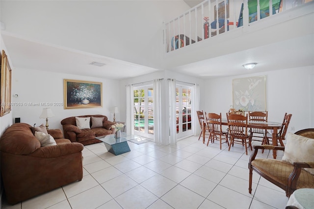 14823 SW 139th Ct, Miami, FL 33186 - living room featuring light tile patterned floors and a high ceiling