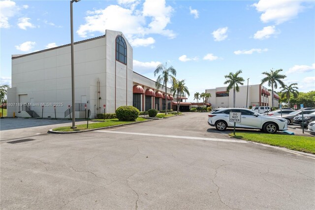 9220 S Hollybrook Lake Dr Unit 208, Pembroke Pines, FL 33025 - view of asphalt street featuring curbs