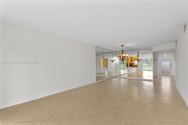 9220 S Hollybrook Lake Dr Unit 208, Pembroke Pines, FL 33025 - unfurnished room with a chandelier