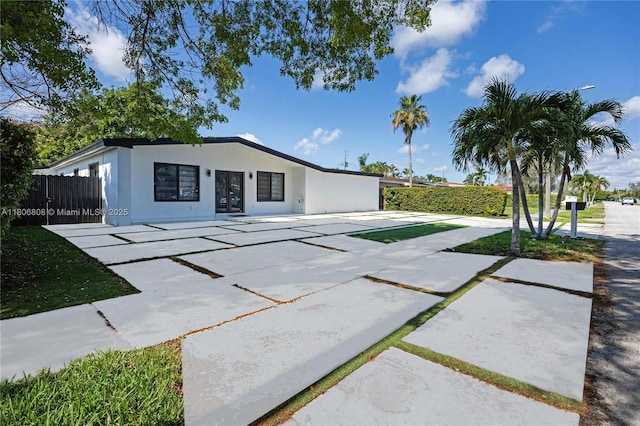 9240 SW 57th Ter, Miami, FL 33173 - view of front of home featuring stucco siding and a patio area