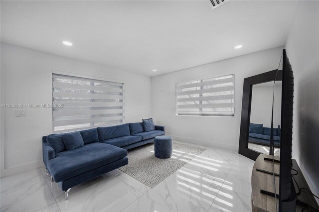 9240 SW 57th Ter, Miami, FL 33173 - living room featuring marble finish floors, recessed lighting, and baseboards