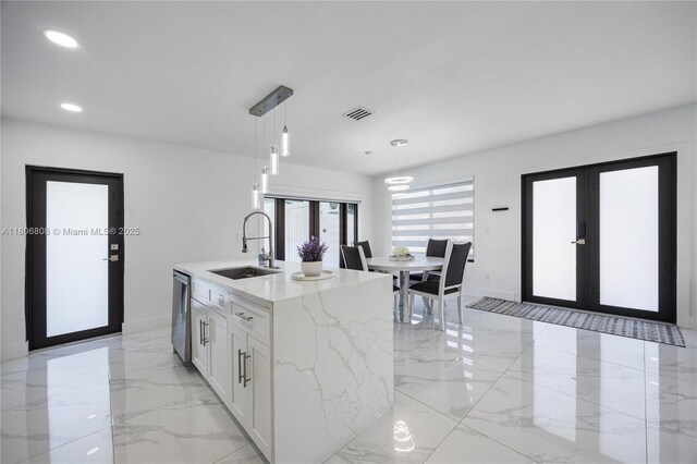 9240 SW 57th Ter, Miami, FL 33173 - kitchen with a sink, french doors, light marble finish flooring, pendant lighting, and recessed lighting