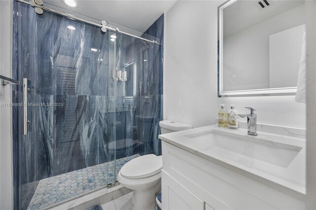 9240 SW 57th Ter, Miami, FL 33173 - full bathroom featuring vanity, toilet, and a marble finish shower