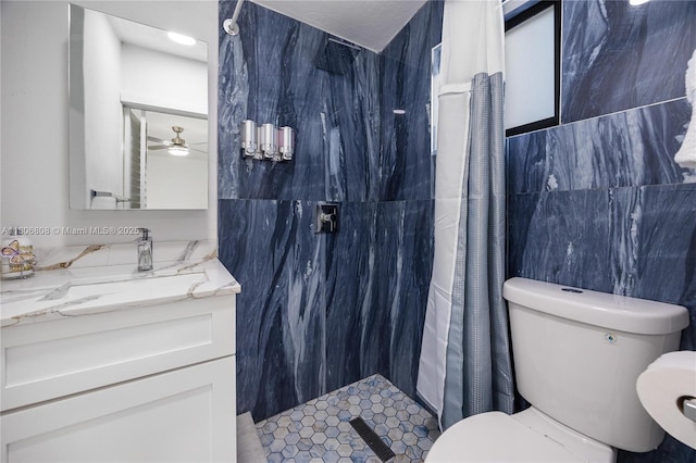 9240 SW 57th Ter, Miami, FL 33173 - full bathroom featuring tile walls, toilet, curtained shower, vanity, and ceiling fan
