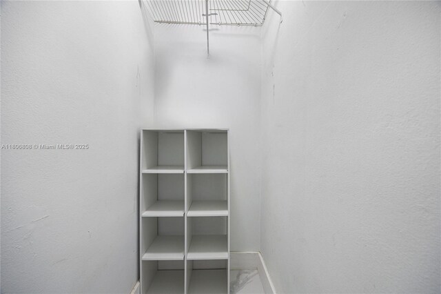 9240 SW 57th Ter, Miami, FL 33173 - walk in closet with marble look tiles