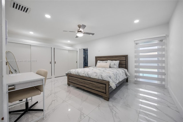 9240 SW 57th Ter, Miami, FL 33173 - bedroom featuring recessed lighting, multiple closets, a desk, baseboards, and light marble finish flooring