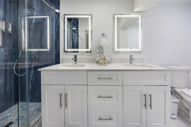 9240 SW 57th Ter, Miami, FL 33173 - bathroom with toilet, a stall shower, and double vanity