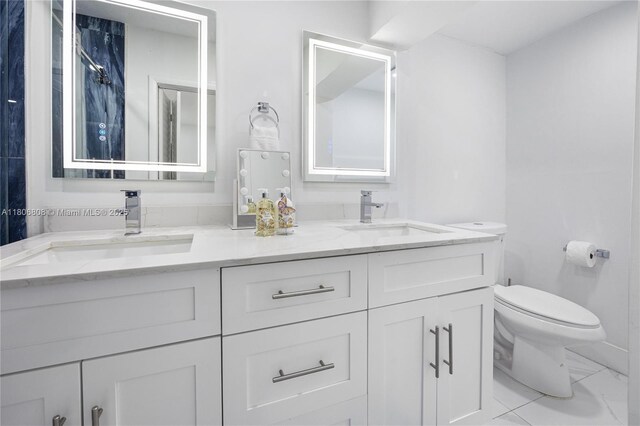 9240 SW 57th Ter, Miami, FL 33173 - full bath with toilet, double vanity, and marble finish flooring