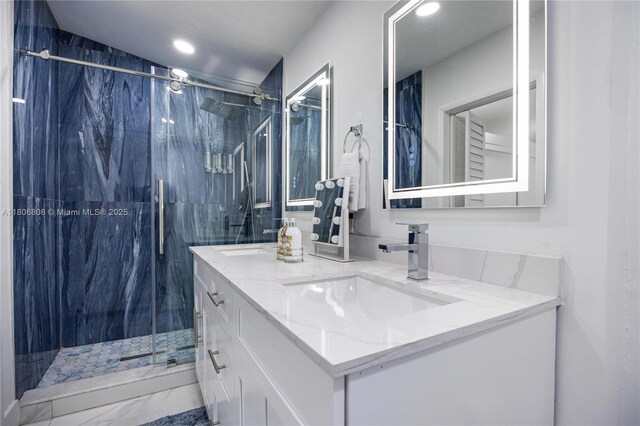 9240 SW 57th Ter, Miami, FL 33173 - bathroom with double vanity, a marble finish shower, marble finish floors, and recessed lighting