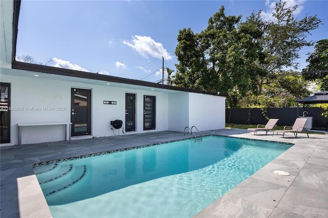9240 SW 57th Ter, Miami, FL 33173 - view of swimming pool featuring a patio