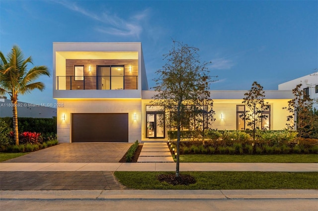 16703 S Botaniko Dr S, Weston, FL 33326 - contemporary home featuring a garage, a balcony, and decorative driveway