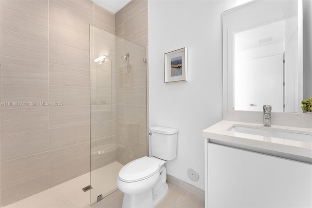 16703 S Botaniko Dr S, Weston, FL 33326 - bathroom with tiled shower, toilet, vanity, and tile patterned flooring