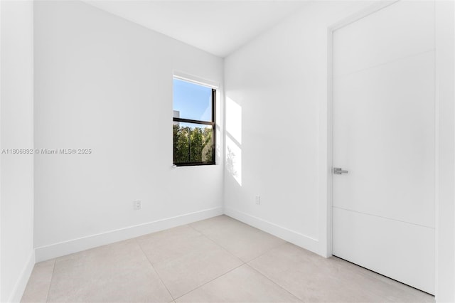 16703 S Botaniko Dr S, Weston, FL 33326 - empty room with baseboards and light tile patterned floors