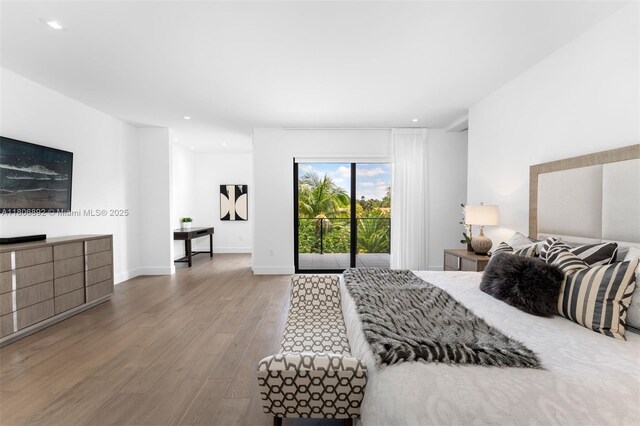 16703 S Botaniko Dr S, Weston, FL 33326 - bedroom featuring wood finished floors, recessed lighting, access to exterior, and baseboards