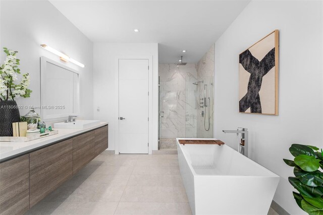 16703 S Botaniko Dr S, Weston, FL 33326 - bathroom featuring a marble finish shower, vanity, a freestanding tub, and recessed lighting