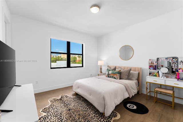 16703 S Botaniko Dr S, Weston, FL 33326 - bedroom with wood finished floors and baseboards