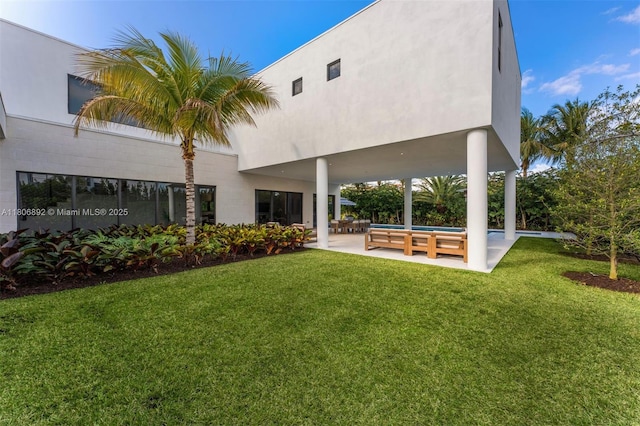 16703 S Botaniko Dr S, Weston, FL 33326 - rear view of house with a patio and a yard