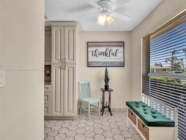 13785 Flora Pl Unit A, Delray Beach, FL 33484 - corridor featuring light flooring and a textured ceiling