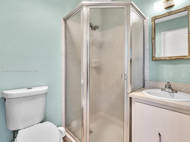 13785 Flora Pl Unit A, Delray Beach, FL 33484 - full bath featuring vanity, a stall shower, and a textured wall