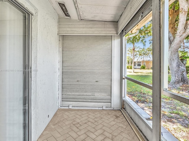 13785 Flora Pl Unit A, Delray Beach, FL 33484 - unfurnished sunroom featuring plenty of natural light