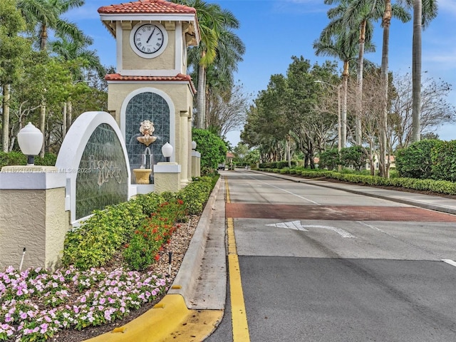13785 Flora Pl Unit A, Delray Beach, FL 33484 - view of asphalt road with curbs and street lighting