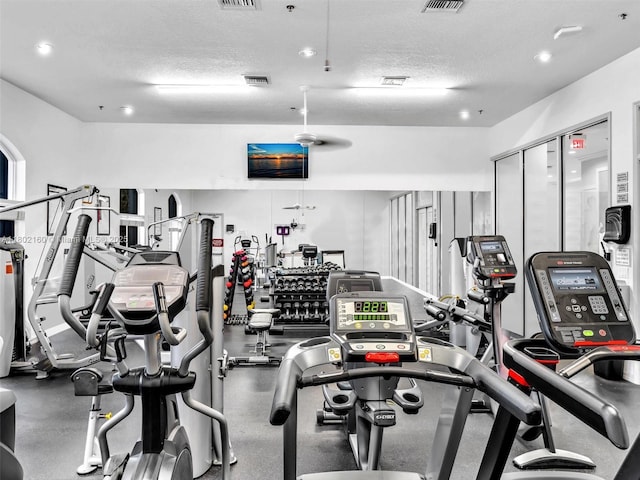 13785 Flora Pl Unit A, Delray Beach, FL 33484 - gym with a textured ceiling and recessed lighting