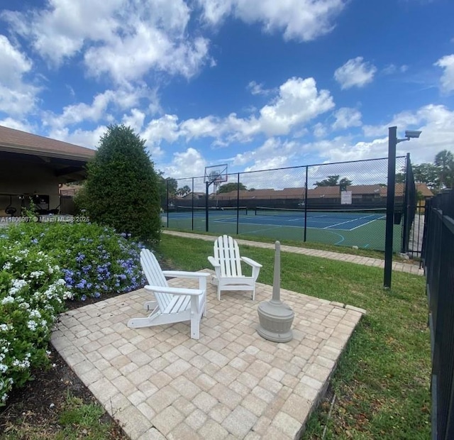 8015 SW 21st Ct, Davie, FL 33324 - view of patio featuring community basketball court and a tennis court