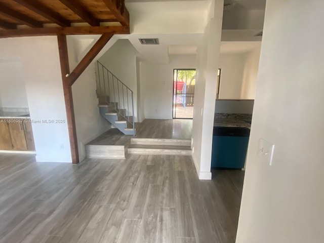 8015 SW 21st Ct, Davie, FL 33324 - entrance foyer featuring wood finished floors, stairway, beamed ceiling, and baseboards