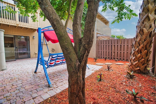 8015 SW 21st Ct, Davie, FL 33324 - view of yard featuring a balcony and a patio area