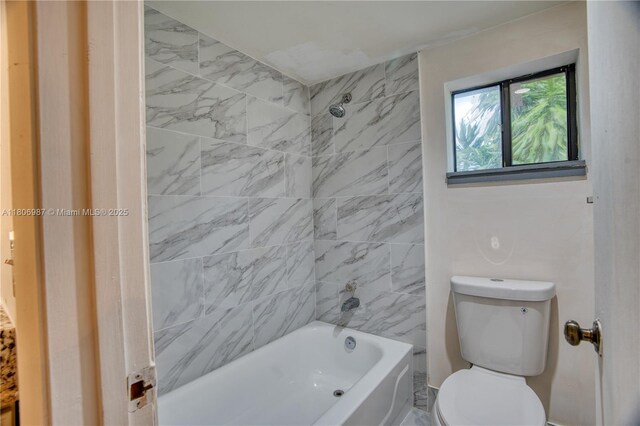 8015 SW 21st Ct, Davie, FL 33324 - bathroom featuring toilet and shower / washtub combination
