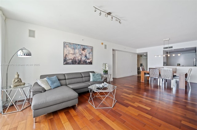 3330 NE 190th St Unit 717, Aventura, FL 33180 - living room featuring wood finished floors and track lighting