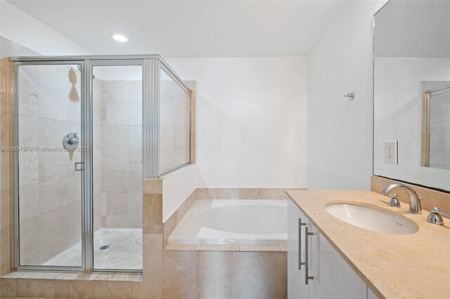 3330 NE 190th St Unit 717, Aventura, FL 33180 - full bath with a stall shower, a bath, vanity, and recessed lighting