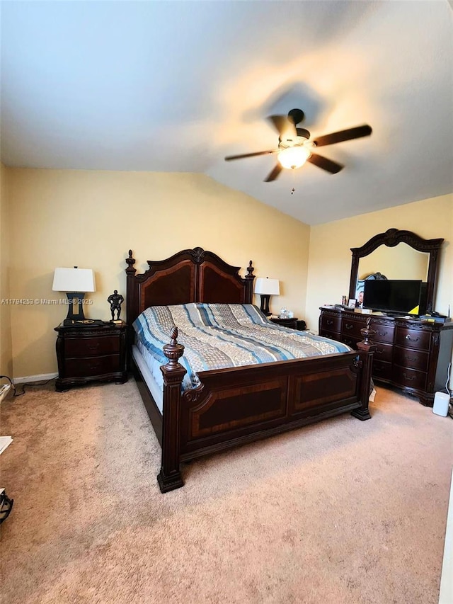8014 Big Pine Way, Riviera Beach, FL 33407 - bedroom with light carpet, vaulted ceiling, and a ceiling fan
