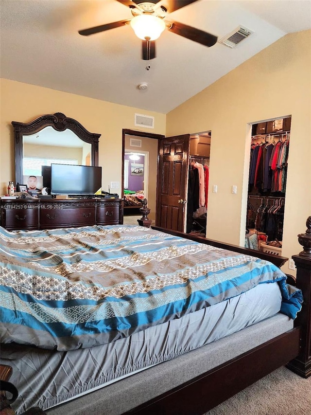 8014 Big Pine Way, Riviera Beach, FL 33407 - carpeted bedroom featuring lofted ceiling, two closets, and a ceiling fan