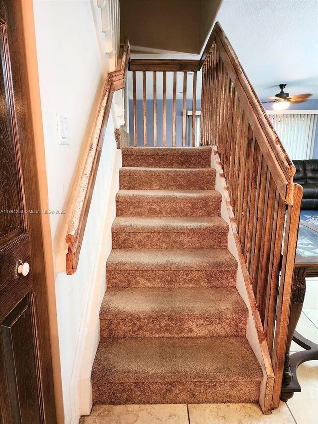 8014 Big Pine Way, Riviera Beach, FL 33407 - stairway featuring a ceiling fan