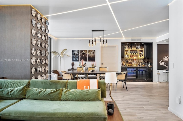 801 S Miami Ave Unit 3510, Miami, FL 33130 - living area featuring bar area and light wood-style floors