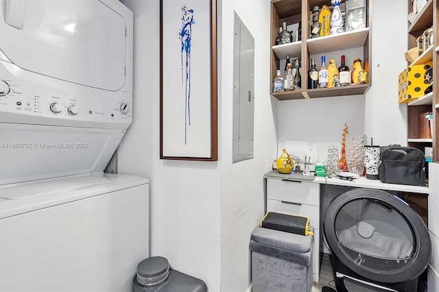 801 S Miami Ave Unit 3510, Miami, FL 33130 - washroom featuring estacked washer and dryer, electric panel, and baseboards