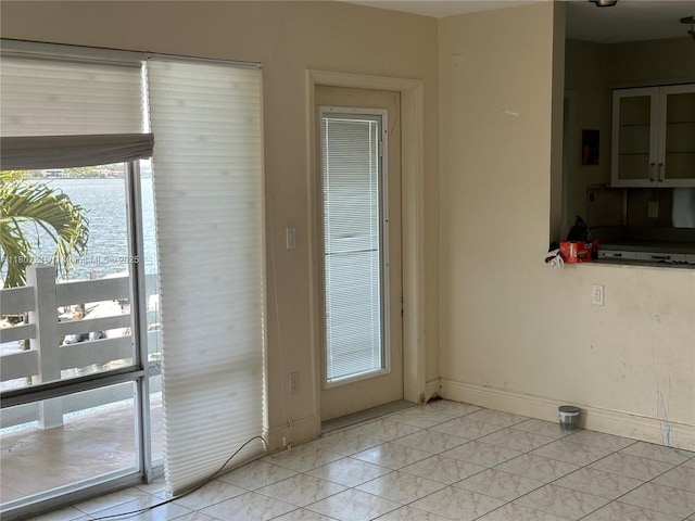 2700 NE 135th St Unit 56, North Miami, FL 33181 - unfurnished dining area featuring healthy amount of natural light and baseboards
