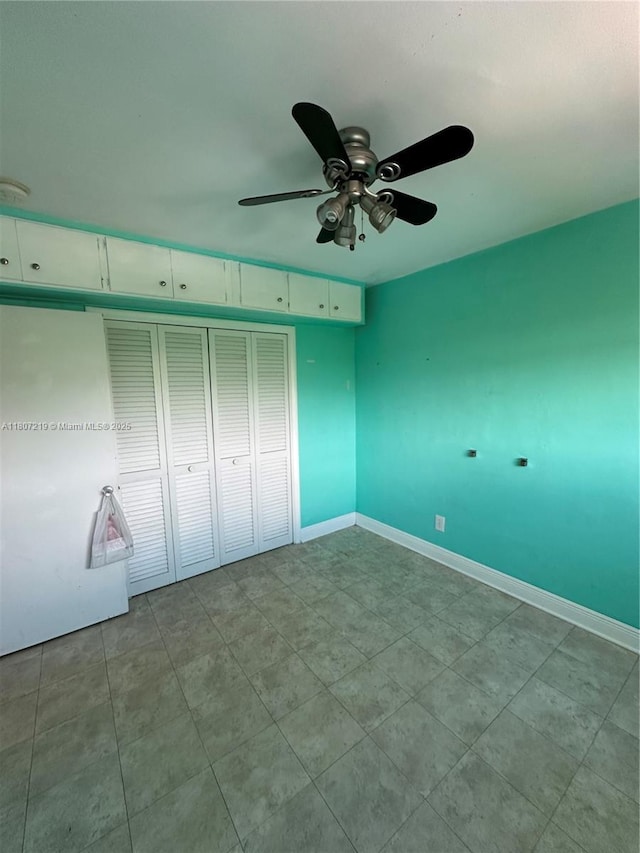 2700 NE 135th St Unit 56, North Miami, FL 33181 - unfurnished bedroom with baseboards and tile patterned flooring