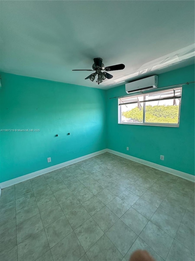 2700 NE 135th St Unit 56, North Miami, FL 33181 - unfurnished room with a wall unit AC, a ceiling fan, and baseboards