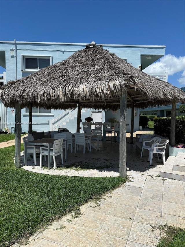 2700 NE 135th St Unit 56, North Miami, FL 33181 - view of patio / terrace with outdoor dining space